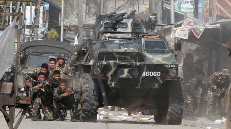 Philippine rebels begin campaign for Muslims' approval of autonomy law