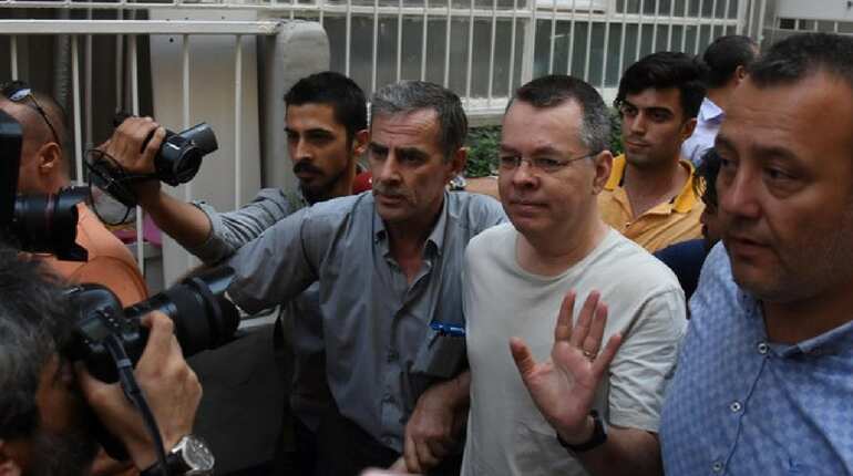Turkey court sentences US pastor to over 3 years in jail but allows him to go free