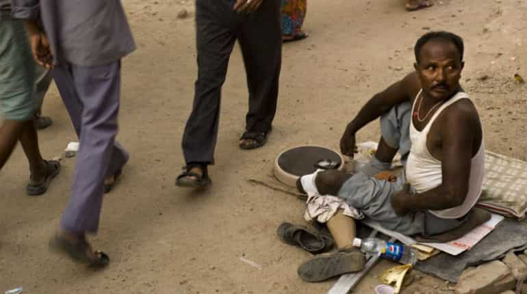 Delhi high court decriminalises begging in national capital Delhi high court decriminalises begging in national capital
