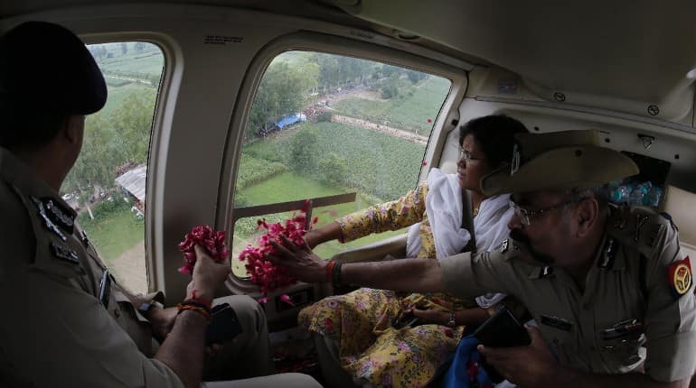 Watch: Senior UP police, administration officials shower rose petals on kanwariyas from helicopter Watch: Senior UP police, administration officials shower rose petals on kanwariyas from helicopter