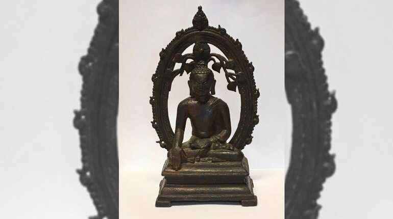 Family of British explorer return old Buddha statue to Sri Lankan temple