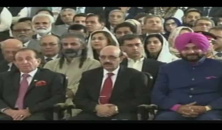 Watch: Sidhu hugs Pakistan army chief, sits next to PoK president Masood Khan