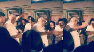 Video: Karnataka minister slammed after he throws biscuits at flood victims