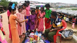Myanmar holds 106 suspected Rohingya Muslims aboard boat: Official