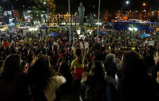 Rio de Janeiro police search slums for gang rape suspects