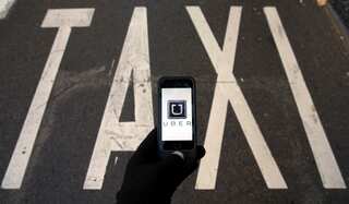 EU cautions governments against banning Uber, Airbnb