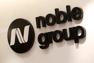 Noble Group to raise funds, cut jobs, chairman plans to step down