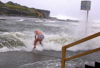 Australia storm pounds east coast, leaves 3 dead