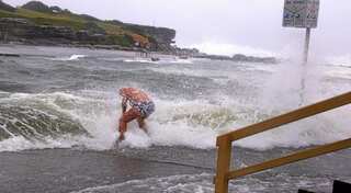 Australia storm sweeps three to their death as it hits east coast