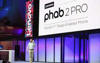 Lenovo looks beyond computers, launches new phones