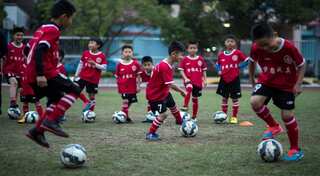 China probes artificial turfs in schools after students fall ill