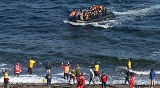 Seven drown after migrant boat overturns off Greek island of Lesbos