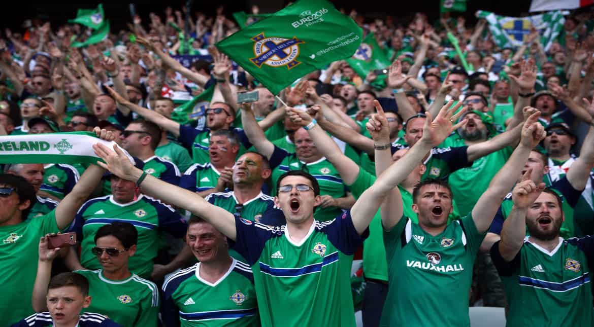 Northern Ireland fans cheer as they wait for Northern Ireland to play Poland in the group stage of the UEFA Euro 2016 football tournament at Allianz Riviera Stadium on June 12, 2016 in Nice, France.