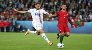 Ronaldo is no Messi, counters Iceland's Arnason