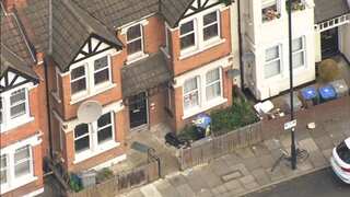 British counter-terrorism officers storm London home, 1 woman injured in shooting