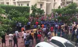 Watch: Noida apartment complex attacked by mob