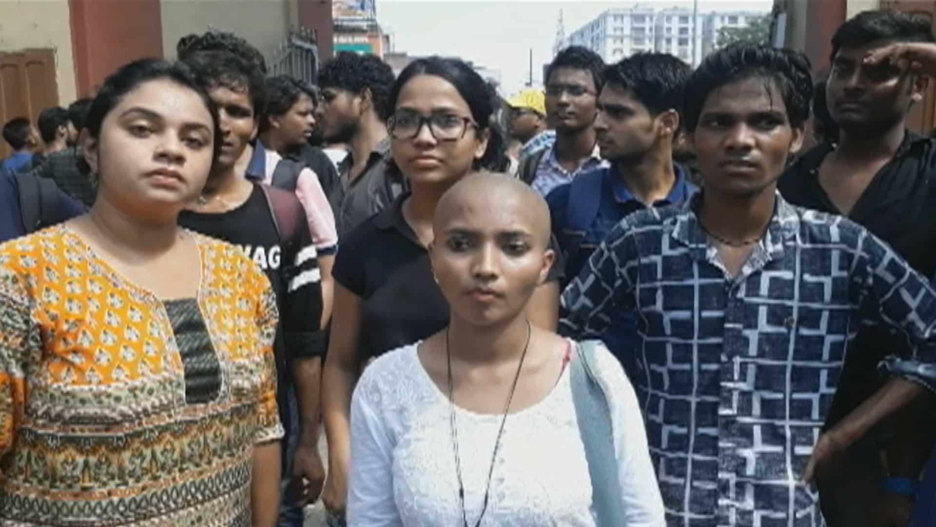 Watch: Banaras Hindu University girl shaves head in protest