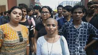 Watch: Banaras Hindu University girl shaves head in protest