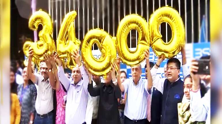 Celebrations at Bombay Stock Exchange office after Sensex breaches 34,000 mark Celebrations at Bombay Stock Exchange office after Sensex breaches 34,000 mark