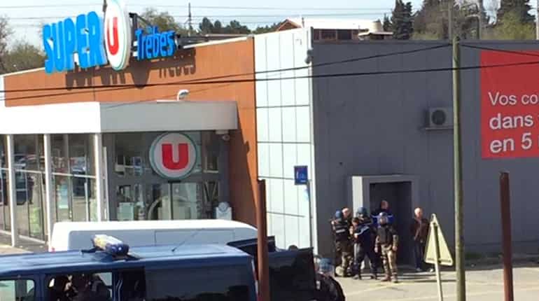 Shooting, hostage-taking at French supermarket; gunman claims allegiance to Islamic State Shooting, hostage-taking at French supermarket; gunman claims allegiance to Islamic State