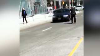 'Kill me,' shouted Toronto van attacker, pointing gun at cop. But the officer didn't shoot