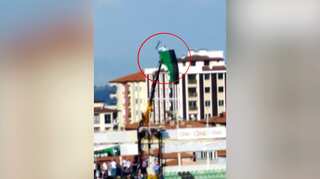Watch: Ban can't deter this Turkey football fan, rents crane to watch game