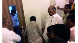 Watch: Sharad Pawar calls press conference, gets stuck in room