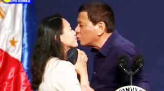Watch: Philippines' Duterte under fire after he kisses woman at event