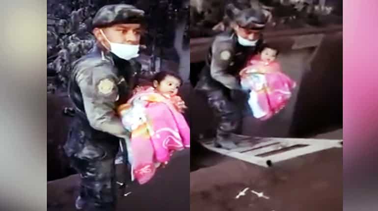 Watch: As volcano rages, Guatemala Police rescue baby girl Watch: As volcano rages, Guatemala Police rescue baby girl