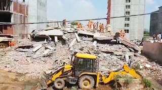 Video: Six-storey building falls on 4-storey building in Greater Noida; 3 dead, several feared trapped