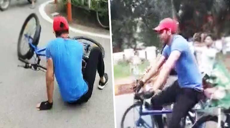 Watch: Lalu's son takes out cycle rally, falls; video goes viral Watch: Lalu's son takes out cycle rally, falls; video goes viral