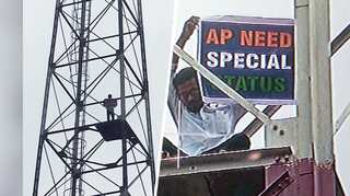 Watch: Man climbs tower in Delhi to demand special status for Andhra Pradesh