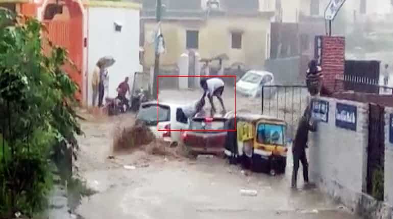 Watch: Men escape from car in Uttarakhand as vehicles disappear in floods