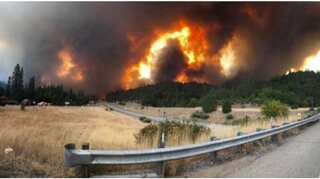 As California city reels from shooting, wildfires threaten