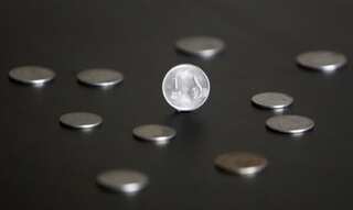 Rupee gains 16 paise against US dollar amid foreign fund inflows