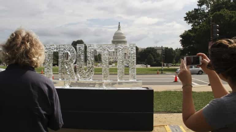 Melting ice sculpture protests 'fake news' at US Capitol Melting ice sculpture protests 'fake news' at US Capitol