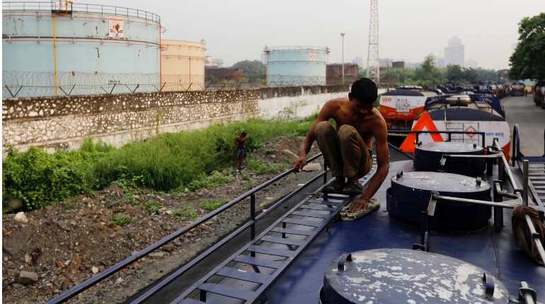 As oil forecasts call for $100, India considers cutting back crude imports