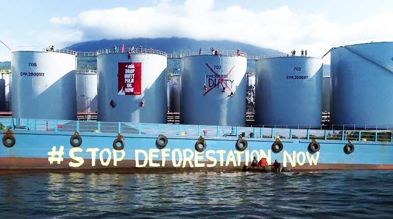 Greenpeace protest deforestation at oil refinery in Indonesia