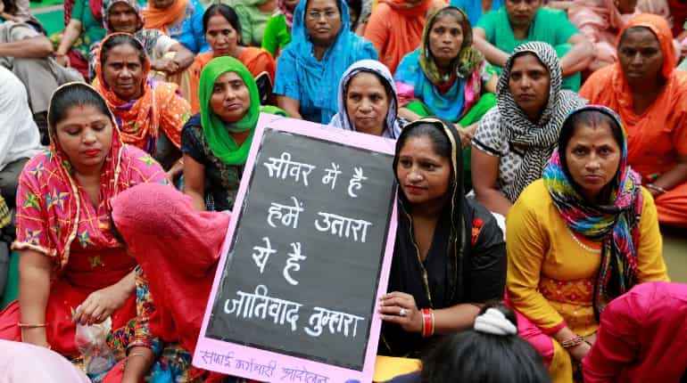 Hundreds of people stage protest in Delhi against deaths of sewer cleaners Hundreds of people stage protest in Delhi against deaths of sewer cleaners