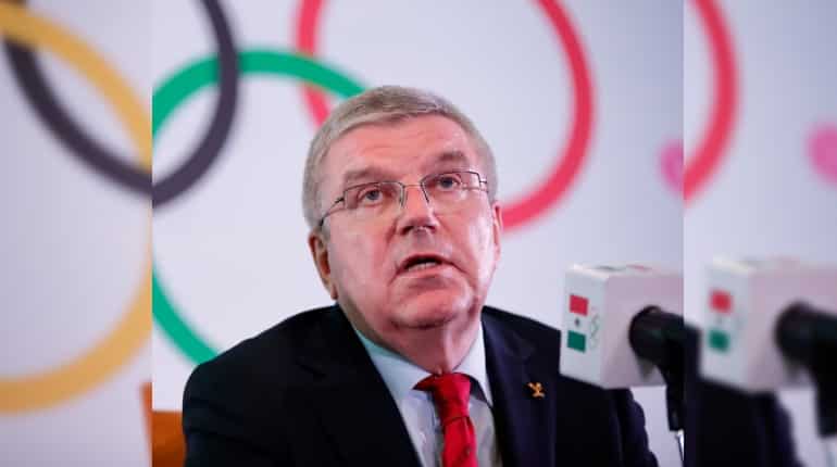 IOC's Bach 'very confident' Tokyo Olympics will have fans IOC's Bach 'very confident' Tokyo Olympics will have fans