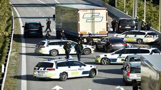 Denmark shuts links to Sweden and Germany as police hunt car