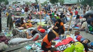 5,000 believed missing in two hard-hit Indonesian quake zones; 1,763 dead