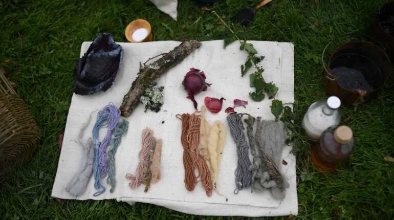 Hand dyed wool is laid out to dry