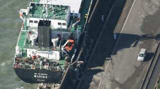 Powerful typhoon kills two, snarls transport for thousands in Japan