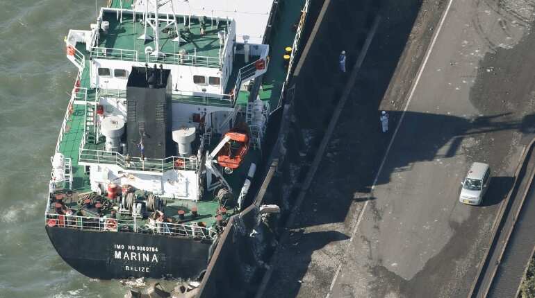 Powerful typhoon kills two, snarls transport for thousands in Japan