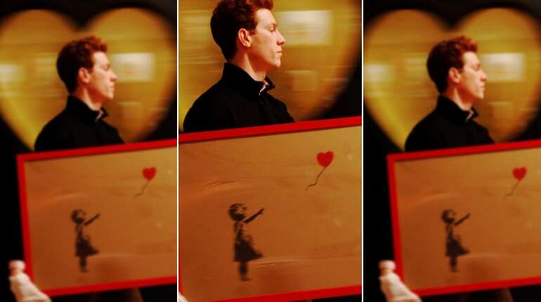 Banksy's 'Girl with Balloon' sells for £1 million... then he shreds it