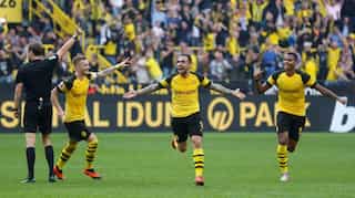 Borussia Dortmund top after Alcacer hat-trick, Bayern thumped