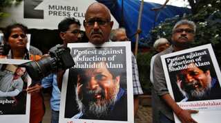 Bangladesh court asks government why jailed photographer should not get bail