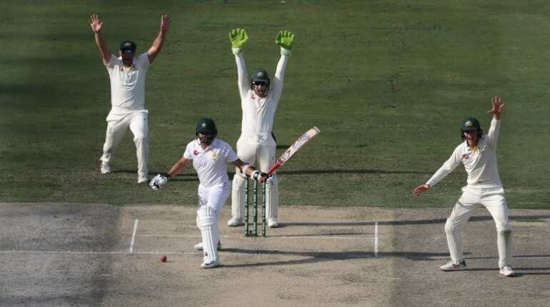 Pakistan cruise to 329-4, Australia toil in Dubai test Pakistan cruise to 329-4, Australia toil in Dubai test