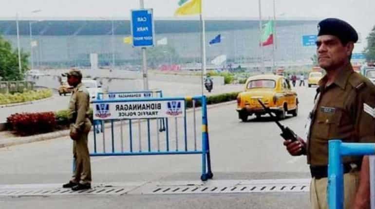 Indian airport police told to cut down on their smiling
